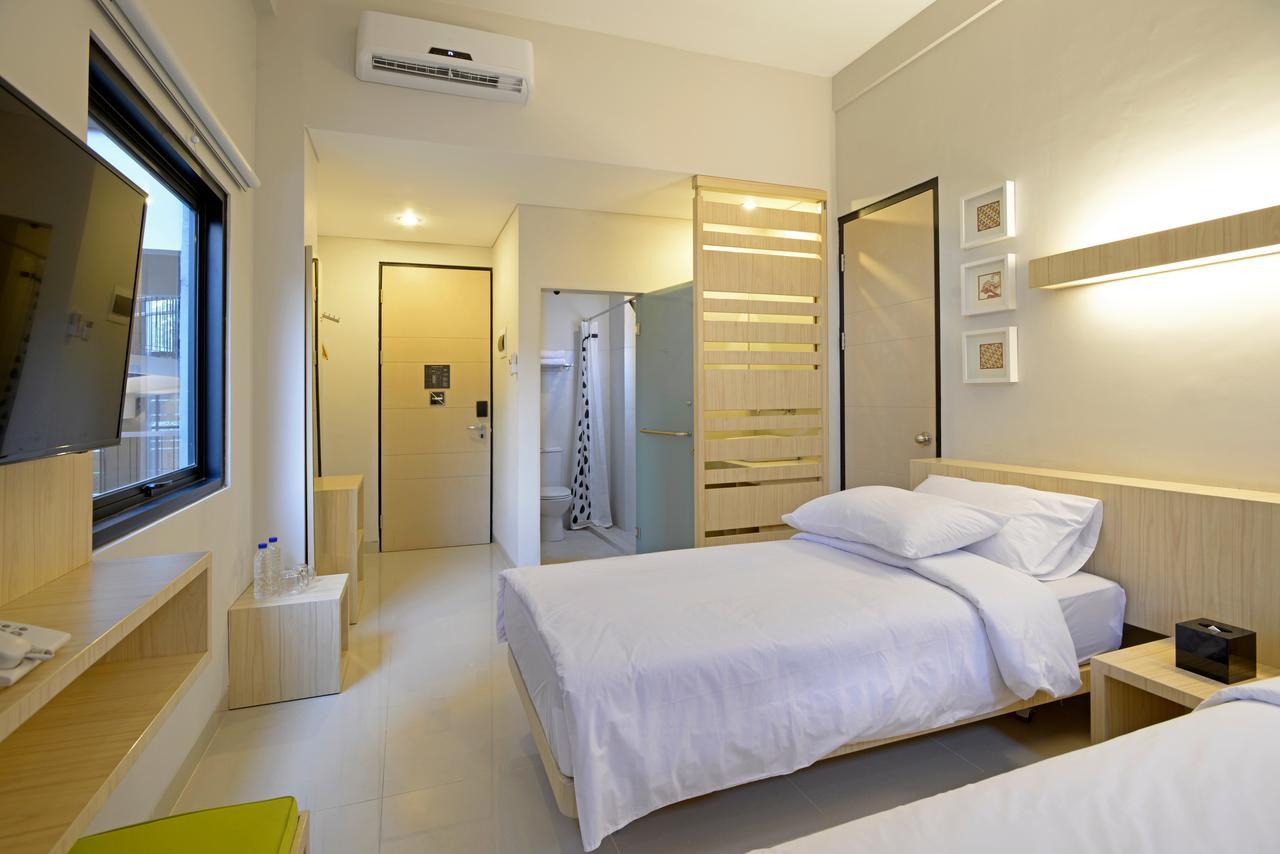 Arjuna Hotel Batu City Esterno foto